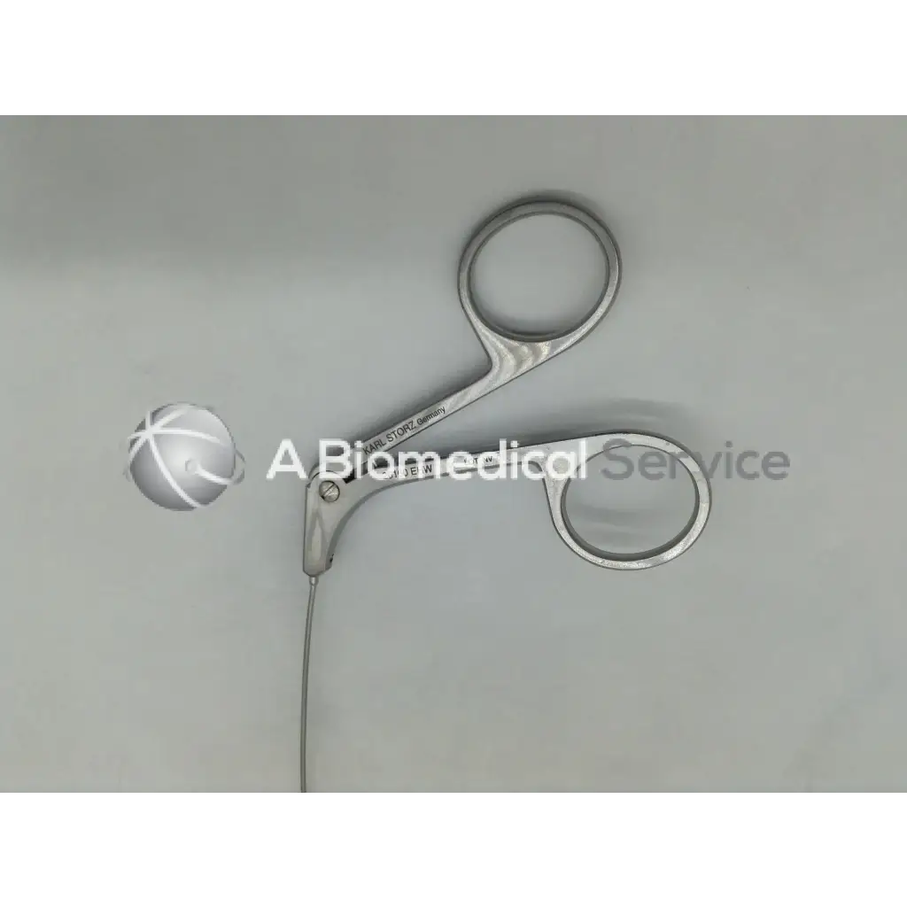 Silver karl storz 26160 ehw semi rigid scissors with curved ergonomic handle for precise medical procedures
