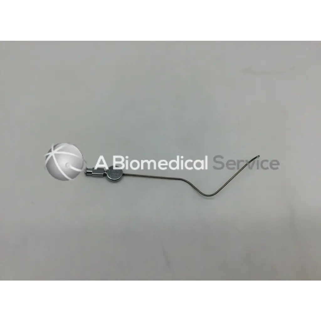 Silver spherical karl storz handpiece instrument with curved metallic stem and small circular joint model ac5-287