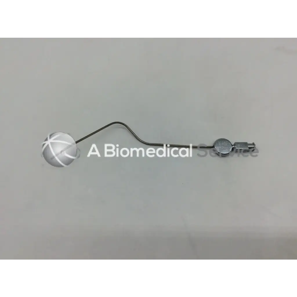 Silver spherical karl storz handpiece instrument with white crosshatch pattern and metallic connector end model ac5-287