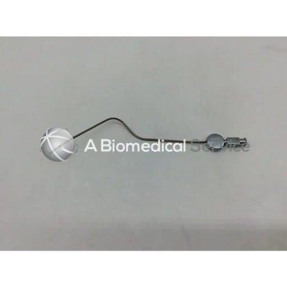 Silver spherical karl storz handpiece instrument with white crosshatch pattern and metallic connector end model ac5-287