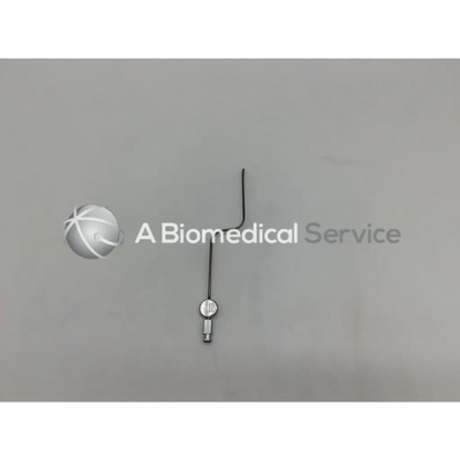 Silver metallic karl storz 28035 b handpiece instrument with curved wire handle and circular end component