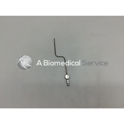 Metallic karl storz 28035 b handpiece instrument with curved slender shaft and circular base component