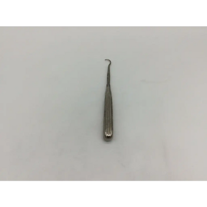 Silver surgical Kirwan 50-1007 ligature carrier fine curved awl with slender textured handle and curved hook tip