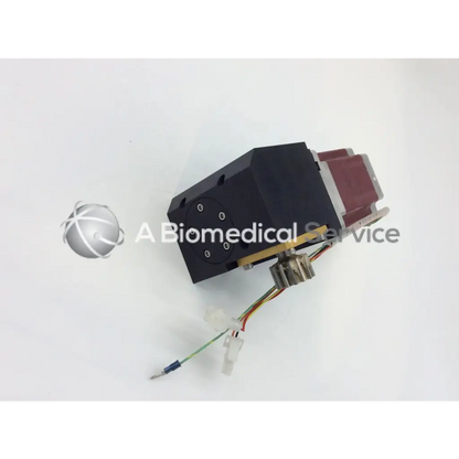 Black and maroon rectangular kollmorgen powerpac k32hrhk-lnk-ns-00 1.8 degree step motor with wiring and connectors