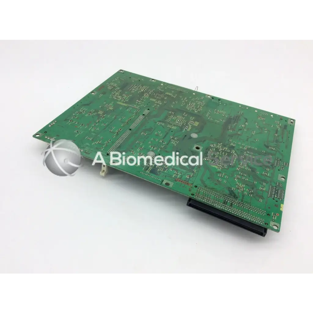 Green rectangular konica circuit control board ep-gf70 with intricate silver traces and mounted electronic components