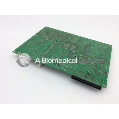Green rectangular konica circuit control board ep-gf70 with intricate silver traces and mounted electronic components