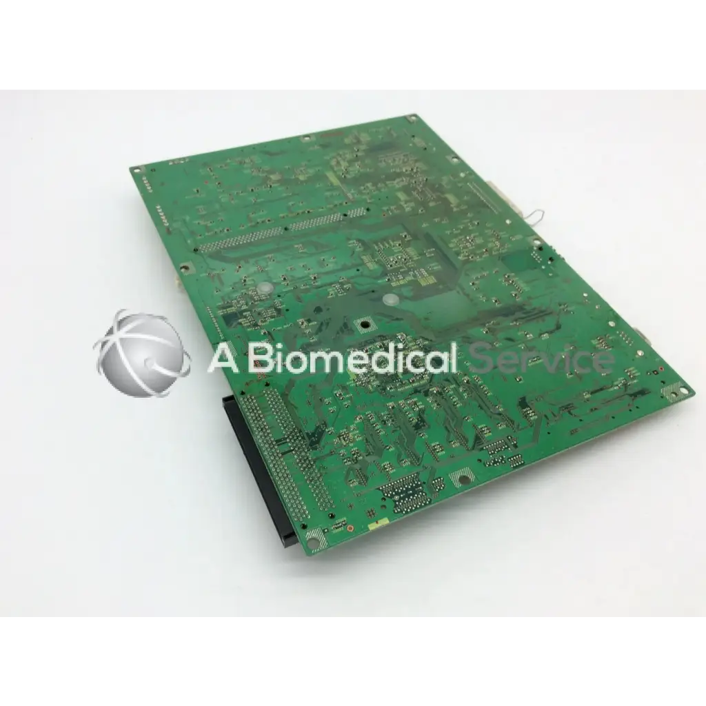 Green rectangular konica circuit control board ep-gf70 with silver traces and electronic components mounted on its surface