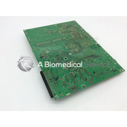 Green rectangular konica circuit control board ep-gf70 with silver traces and electronic components mounted on its surface