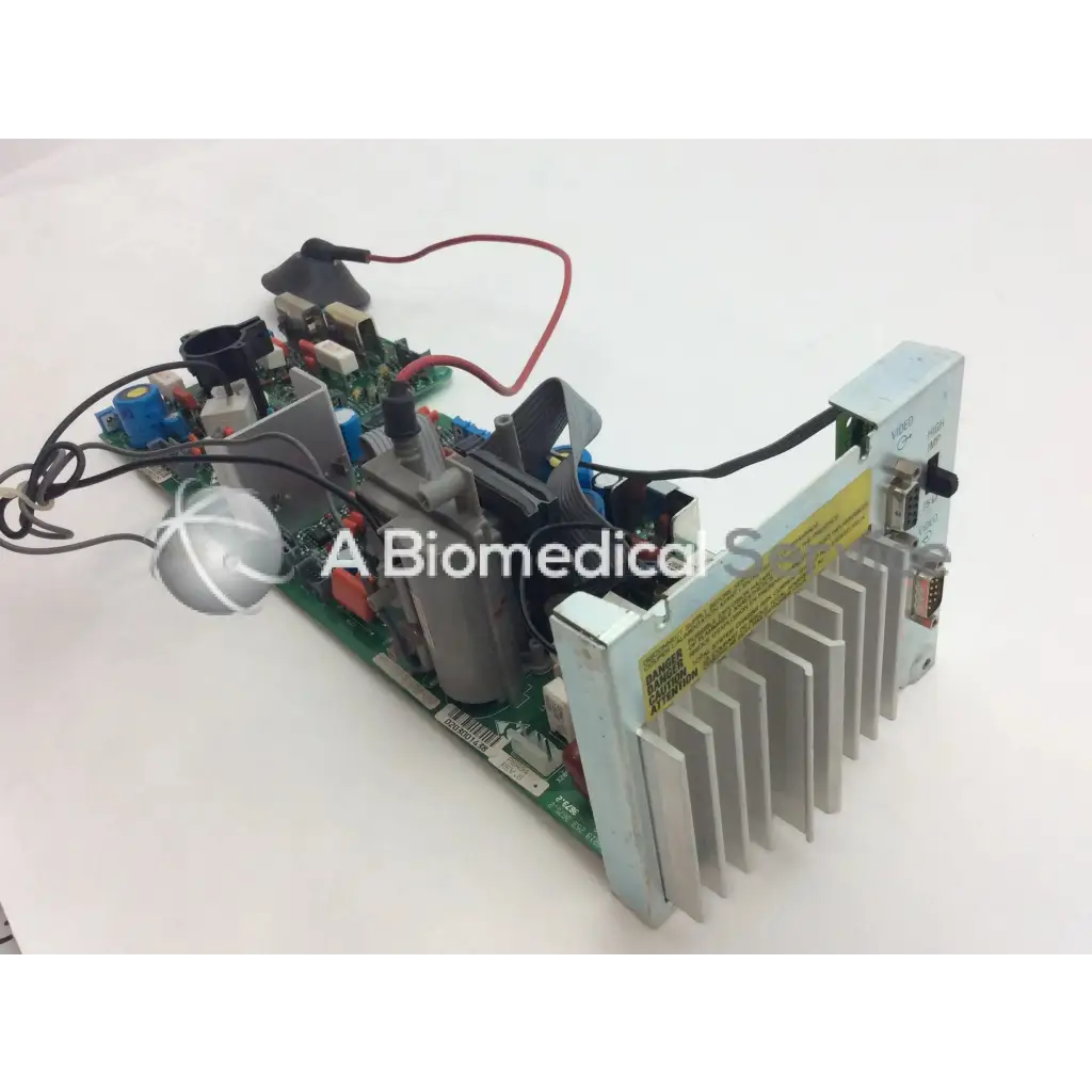 Gray metallic electronic module lARES 105 8219 253 3677.1 3119 203 3619.1 board with green circuit board and bbce5-3 connectors