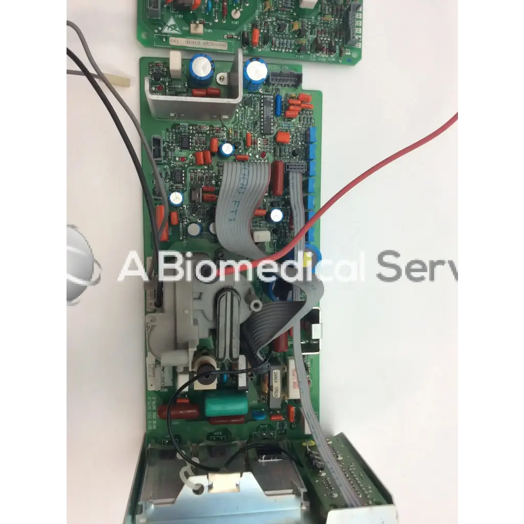 Green circuit board with electronic components and wires for lares 105 8219 bbce5-3 product use