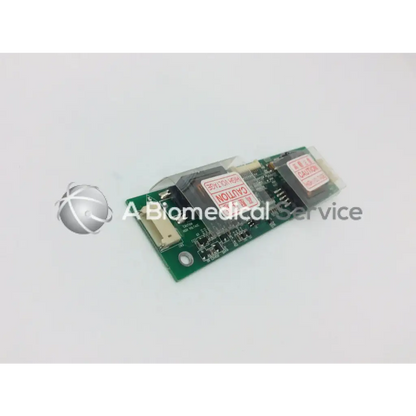 Green rectangular lcd inverter board gh166a with black components and red warning labels for electronic devices
