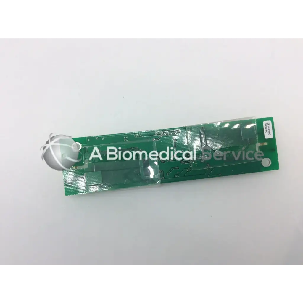 Green rectangular lcd inverter board gh166a with silver spherical component attached at one end for display power control