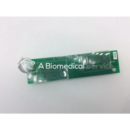 Green rectangular lcd inverter board gh166a with silver spherical component attached at one end for display power control