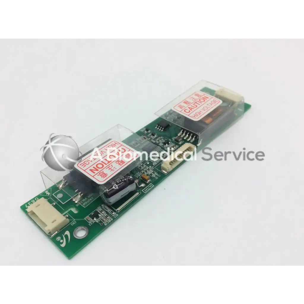 Green lcd inverter board gh166a with black and silver electronic components and red caution labels on white stickers