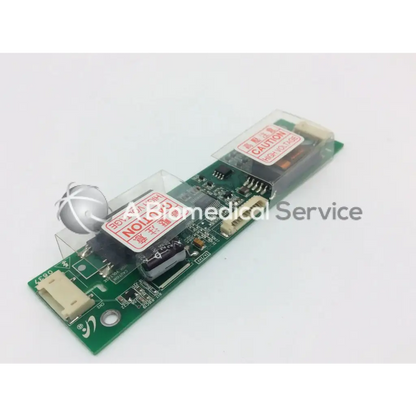 Green lcd inverter board gh166a with black and silver electronic components and red caution labels on white stickers