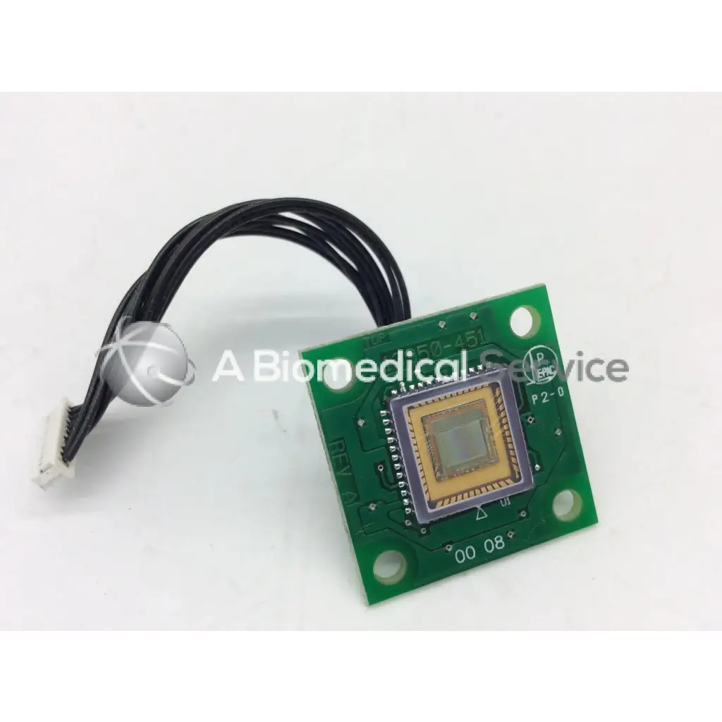 Green rectangular board bbcc1-6 with square sensor module and black cable attached in leica 13950-451 rev a board