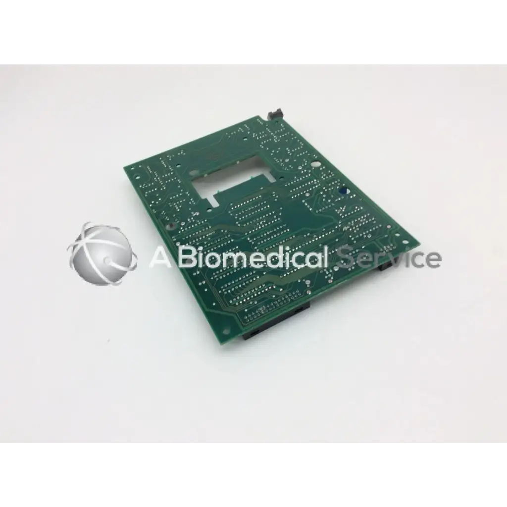 Leica A/N 12450-925 board green rectangular circuit board with intricate copper traces and black corner connectors