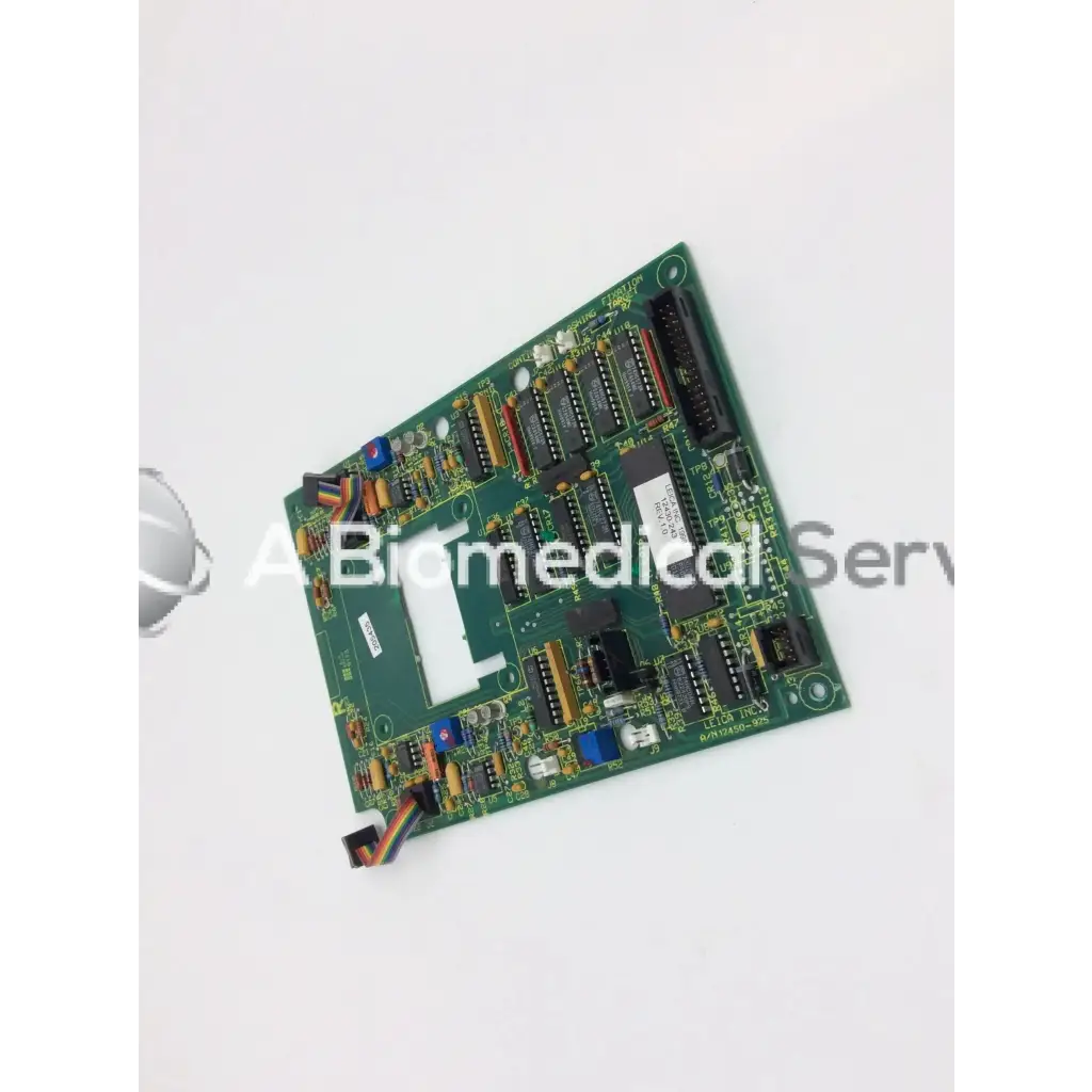 Leica a n 12450-925 green rectangular circuit board with multiple black integrated circuits capacitors and connectors