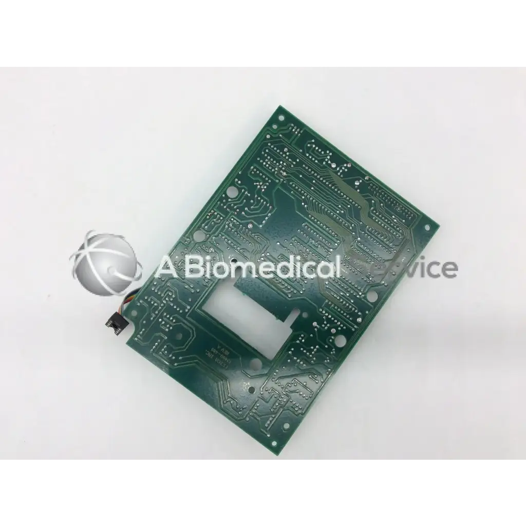 Leica a n 12450-925 green rectangular circuit board with silver traces and a metallic sphere attached to the edge