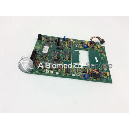 Leica A/N 12450-925 green printed circuit board with black integrated circuits blue capacitors and multi-colored ribbon cable