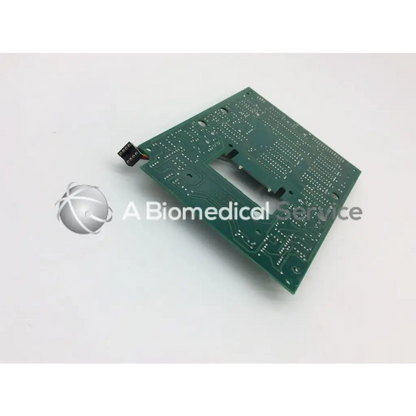 Leica a/n 12450-925 green rectangular circuit board with intricate silver traces and black connector on one corner