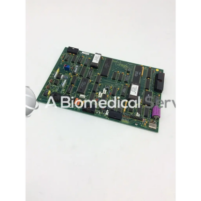 Green rectangular Leica A/N 12450-926 circuit board with black integrated circuits capacitors and connectors