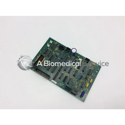 Leica inc A/N 12450-457 rev a green circuit board with black integrated circuits and blue capacitors