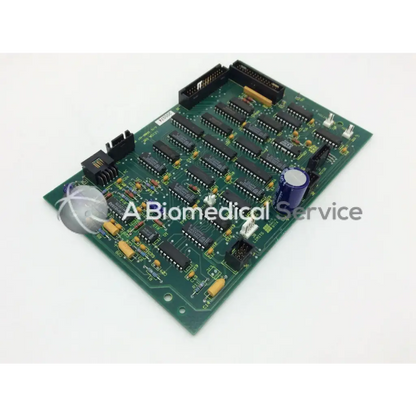 Leica inc a n 12450-457 rev a board green printed circuit board with black integrated circuits yellow and blue capacitors