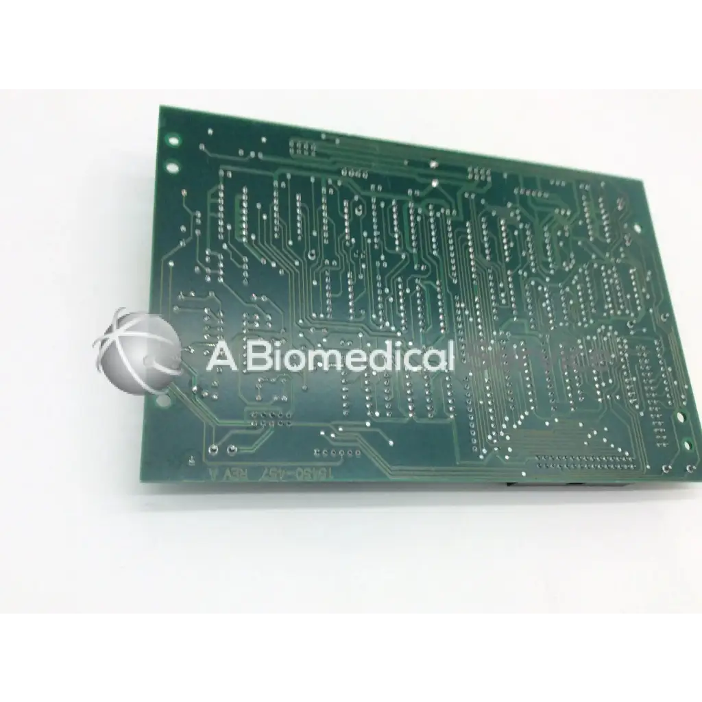 Leica inc a/n 12450-457 rev a green rectangular circuit board with intricate silver conductive traces and solder pads