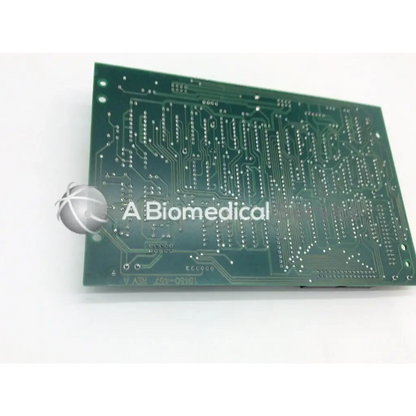 Leica inc a/n 12450-457 rev a green rectangular circuit board with intricate silver conductive traces and solder pads