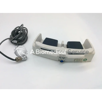 Linemaster Aquiline gray and black dual pedal harmonic scalpel footswitch with coiled cable and metallic spherical sensor attachment