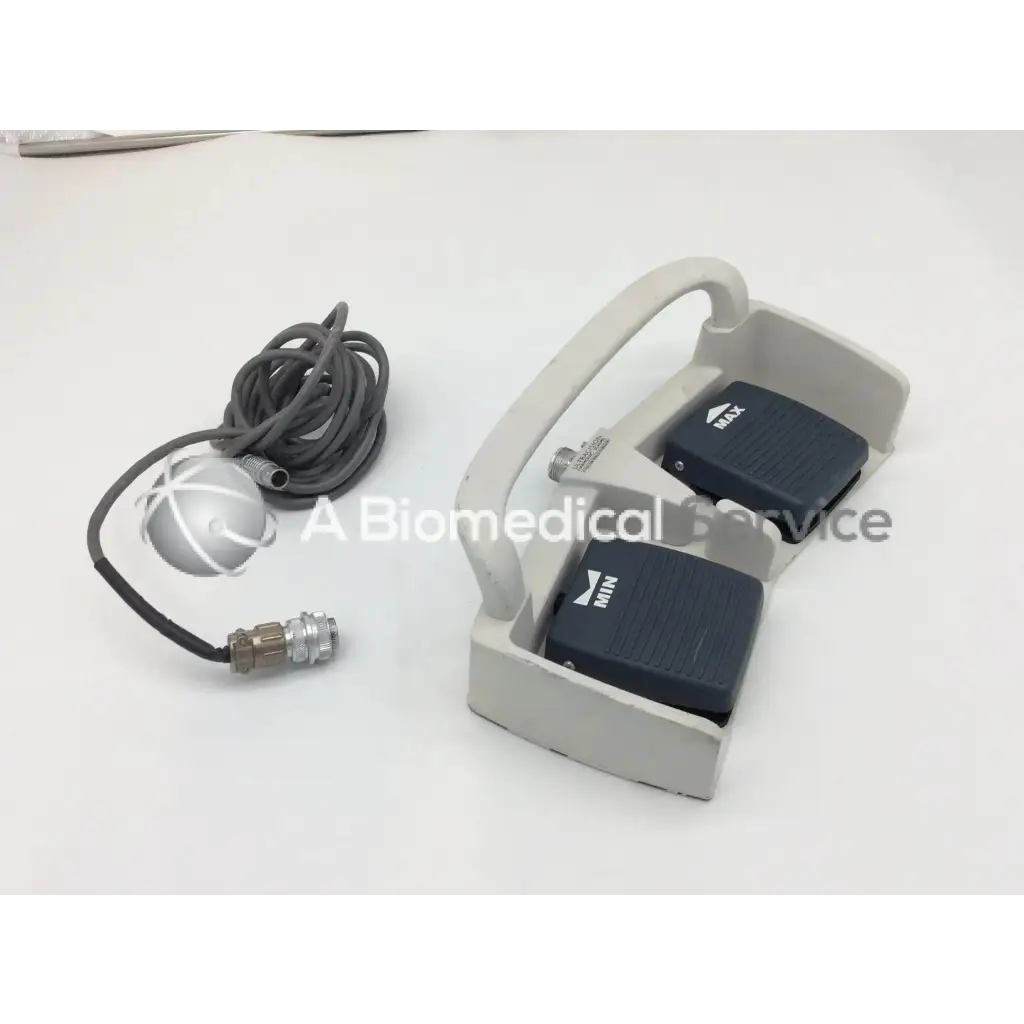 Gray plastic linemaster aquiline harmonic scalpel footswitch with two black max pedals and silver sensor with gray cable