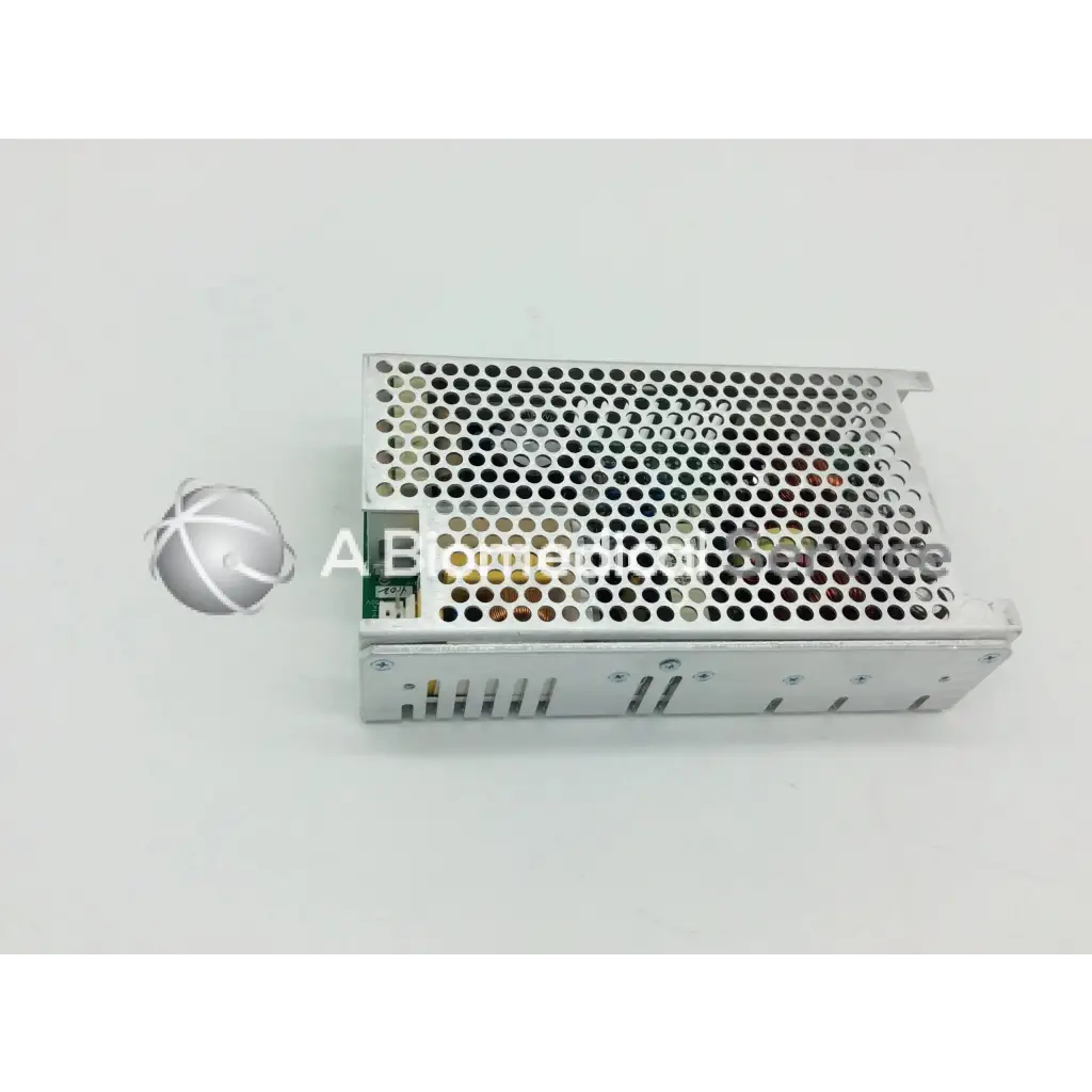 Silver perforated metal ce-150-4102 power supply unit with green circuit board in lumenis powersuite-20w integrated power design