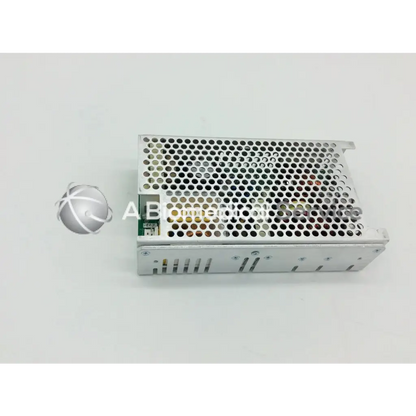 Silver perforated metal ce-150-4102 power supply unit with green circuit board in lumenis powersuite-20w integrated power design