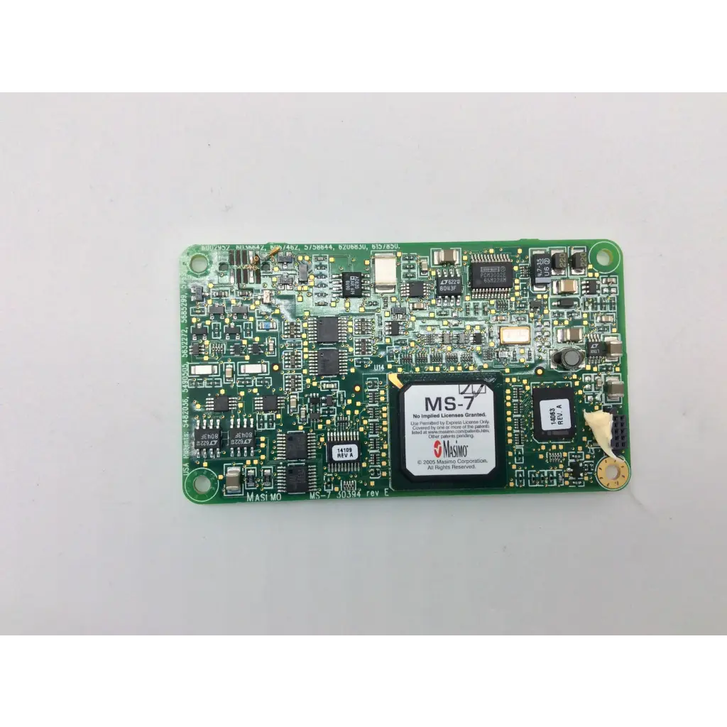 Green spo2 ms-11 masimo spo2 pcb board with black integrated circuits and white ms-7 label from mosaic