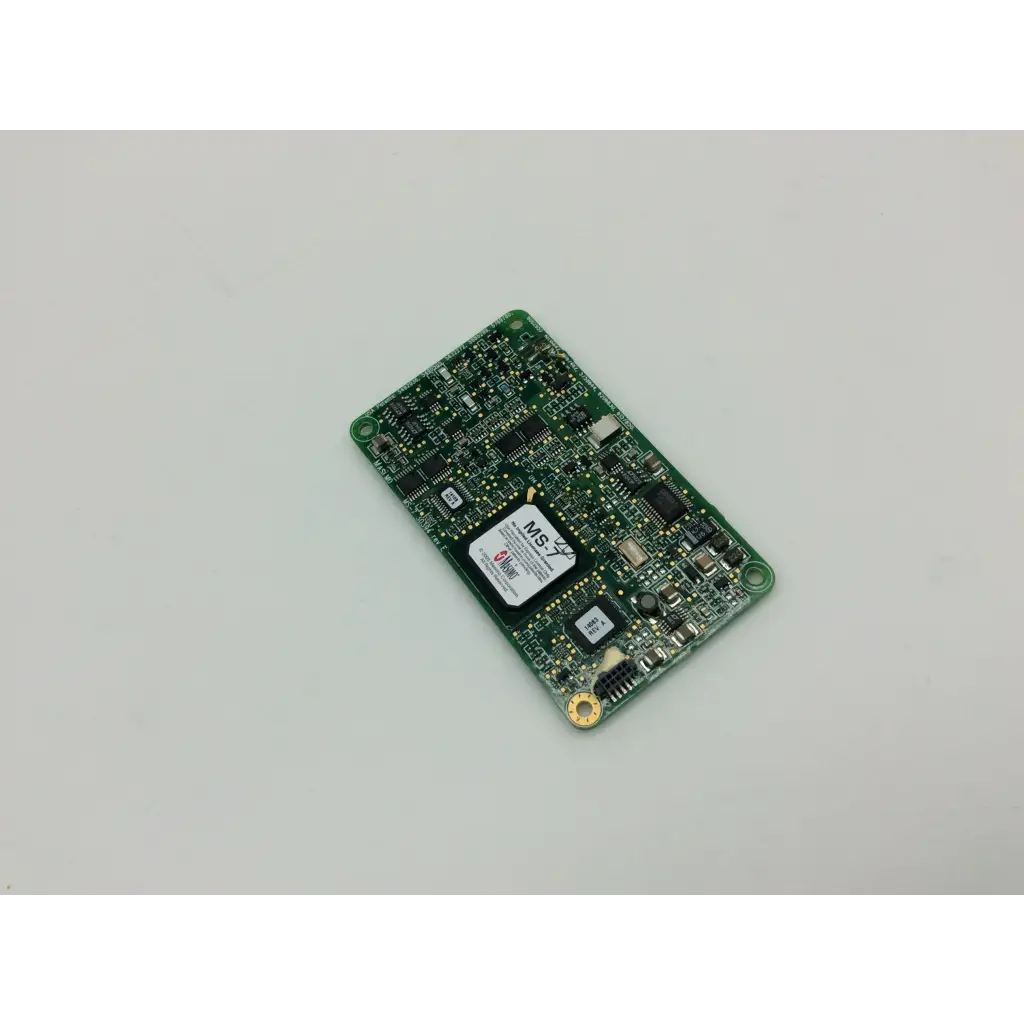 Green rectangular masimo spo2 ms-11 pcb board with electronic components and a white label marked m5 on its surface