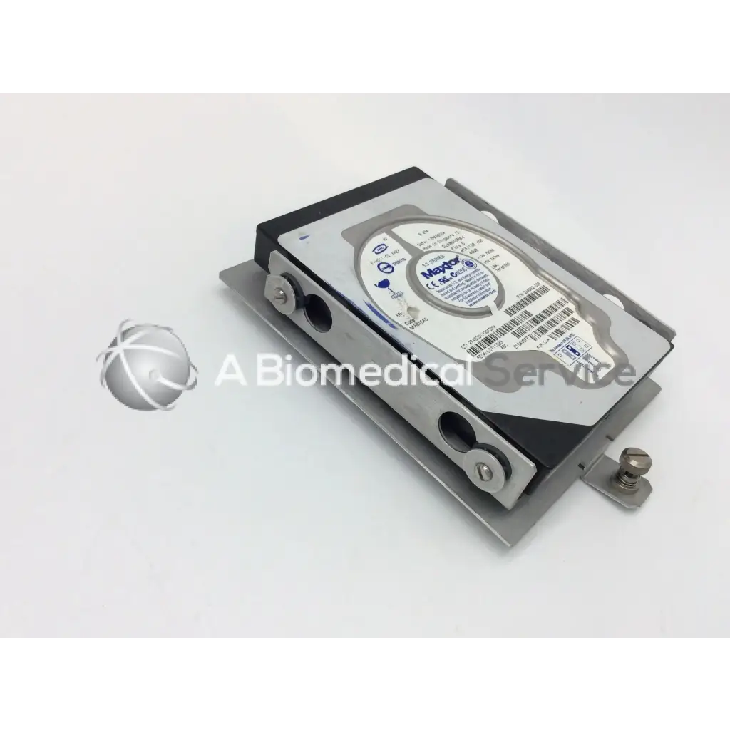 Silver and black maxtor diamondmax plus8 hard drive 40gb mounted in metal bracket for secure storage use