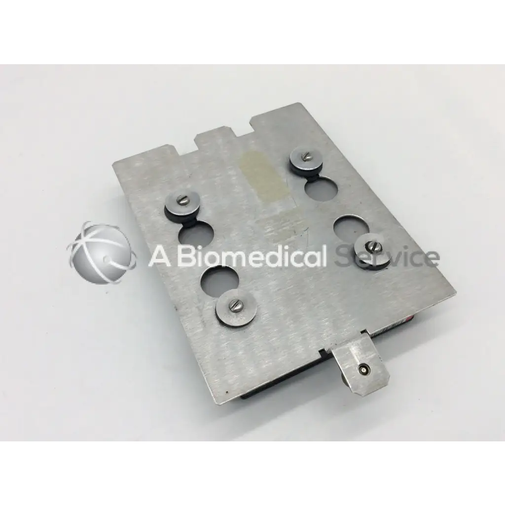 Silver metallic hard drive 40gb plate with circular cutouts and screws back side of maxtor diamondmax plus8 ata