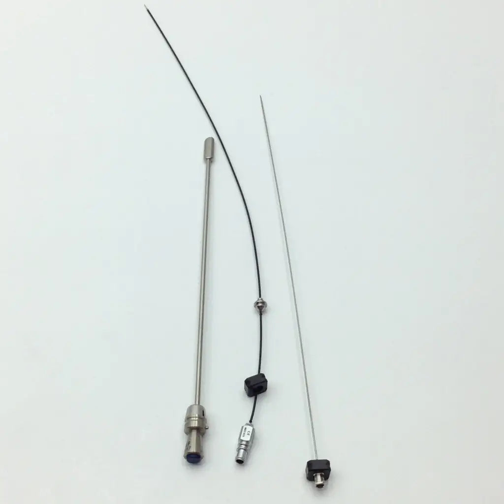 Two slender metallic Wolf tools with black cables in the Med-Stor delicate instrument tray P7540 for surgical use