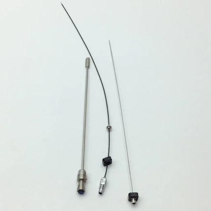 Two slender metallic Wolf tools with black cables in the Med-Stor delicate instrument tray P7540 for surgical use