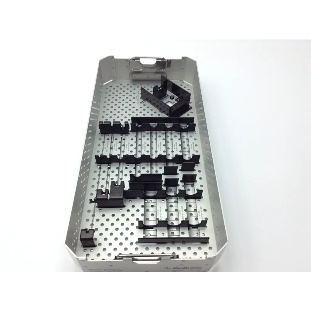 Silver metrx surgical case tray with organized black plastic and metal components for surgical use