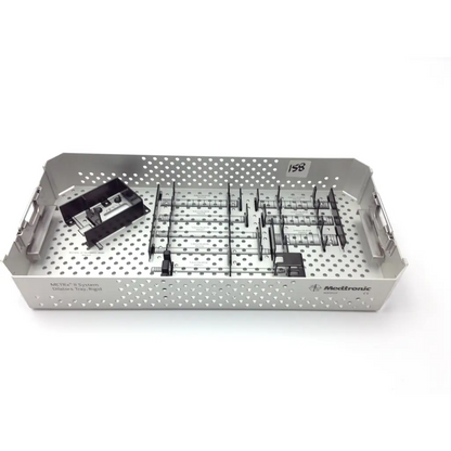 Silver metallic Medtronic METRx surgical case with perforated sides and organized compartments holding black instruments