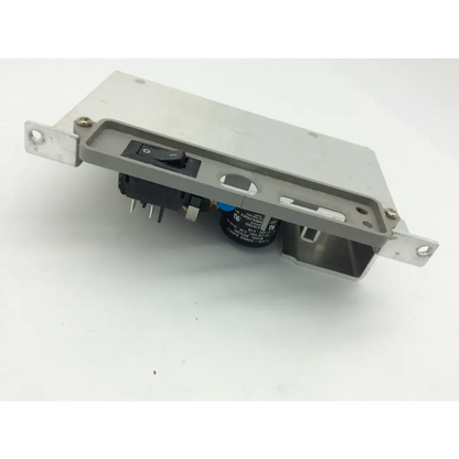 Gray metal electrical switch module with black toggle and blue capacitor in mettler toledo power supply assembly as5336fr
