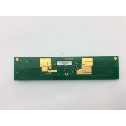 Green rectangular Microsemi lxmg1643-12-64 rev b backlight inverter circuit board with gold solder pads and white label in center
