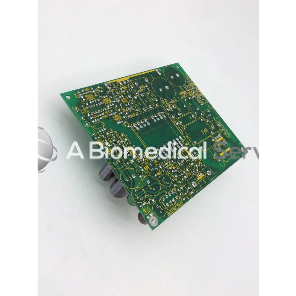 Green rectangular mint mazak circuit board with yellow traces and electronic components model 700156-007 rev a