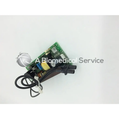 Green circuit board with black wiring and silver spherical component of mitsubishi 938p069010 lamp ballast