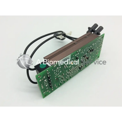 Green printed circuit board with black wires and silver spherical component of mitsubishi 938p069010 lamp ballast