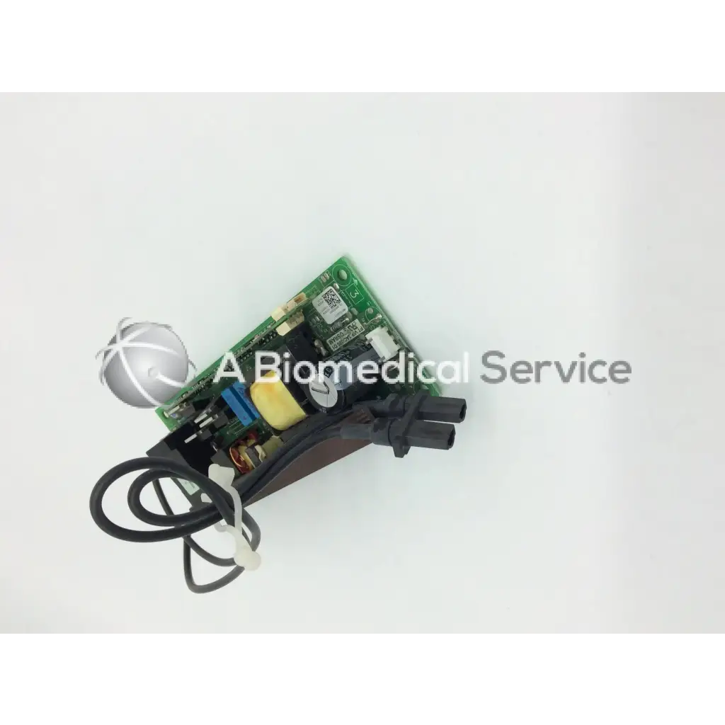 Green circuit board with black wires and silver spherical component of mitsubishi 938p069010 lamp ballast