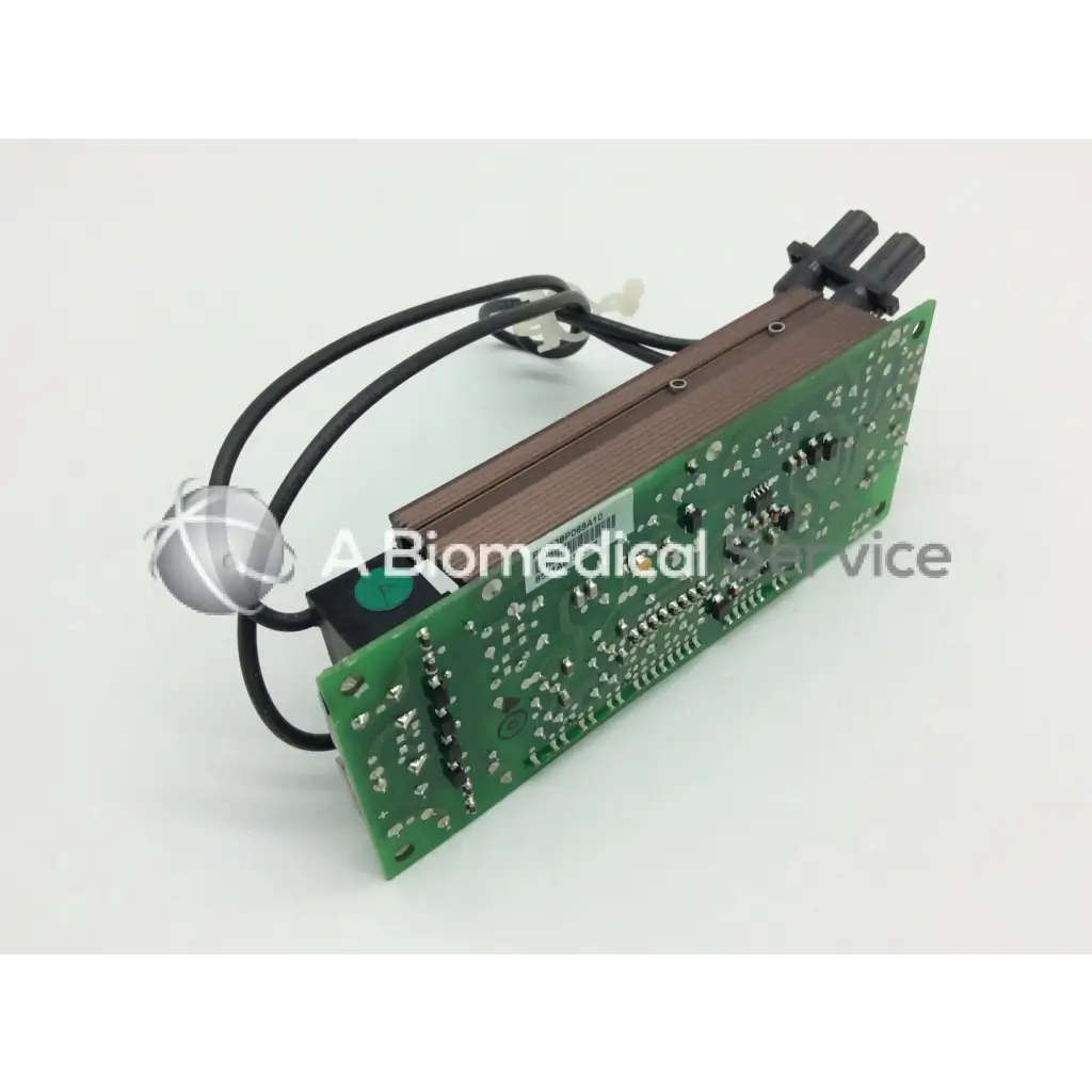 Green printed circuit board with black cables and silver spherical component on mitsubishi 938p069010 lamp ballast