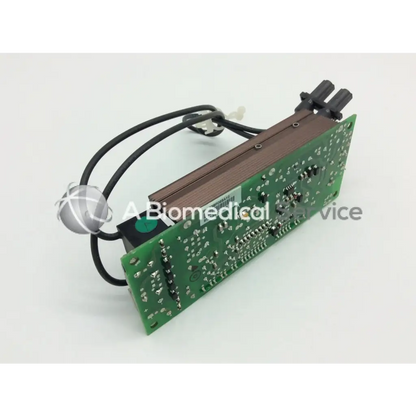 Green printed circuit board with black cables and silver spherical component on mitsubishi 938p069010 lamp ballast